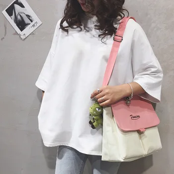 

Korean canvas shoulder bag messenger bag female college student class bag Korean version of large capacity