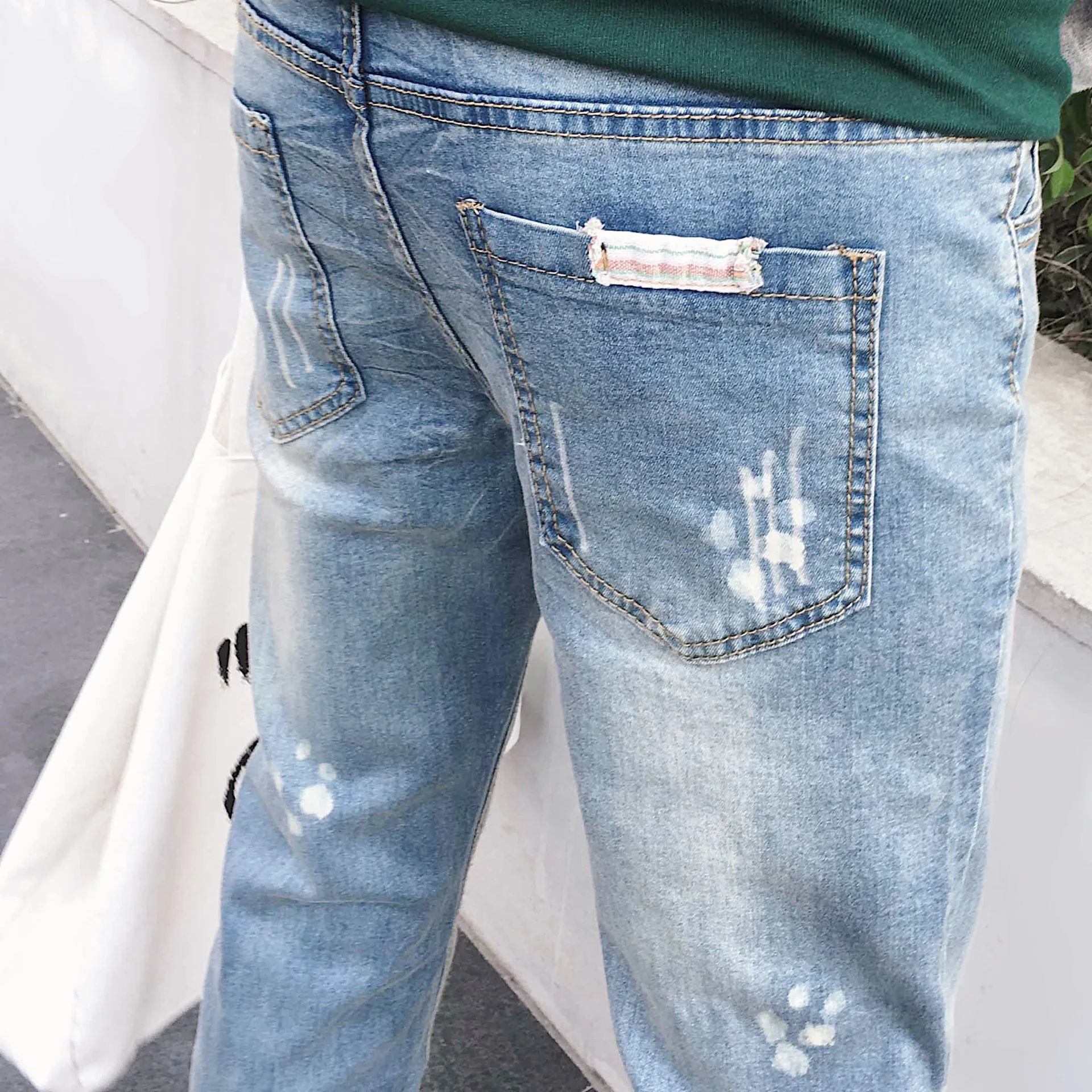 Wholesale Spring Autumn streetwear ripped biker slim fit jeans for men denim classic jeans homme slim pencil jeans men