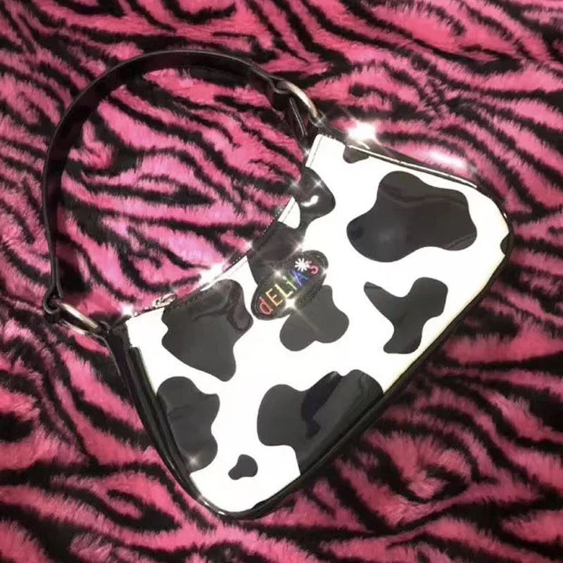 

Japanese and Korean spring and summer new retro cow spot personalized method stick bag fashion armpit bag versatile handbag