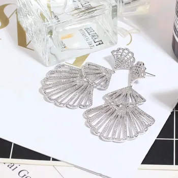 

Europe and America heavy industry dense inlay color zirconium fan hollow Earrings temperament fashion personality delicate luxur