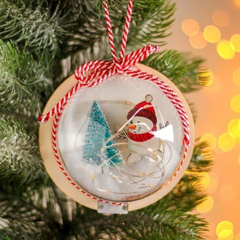 

Christmas ball with a wooden figure and lighting "Snowman and Christmas tree" 12x12 cm