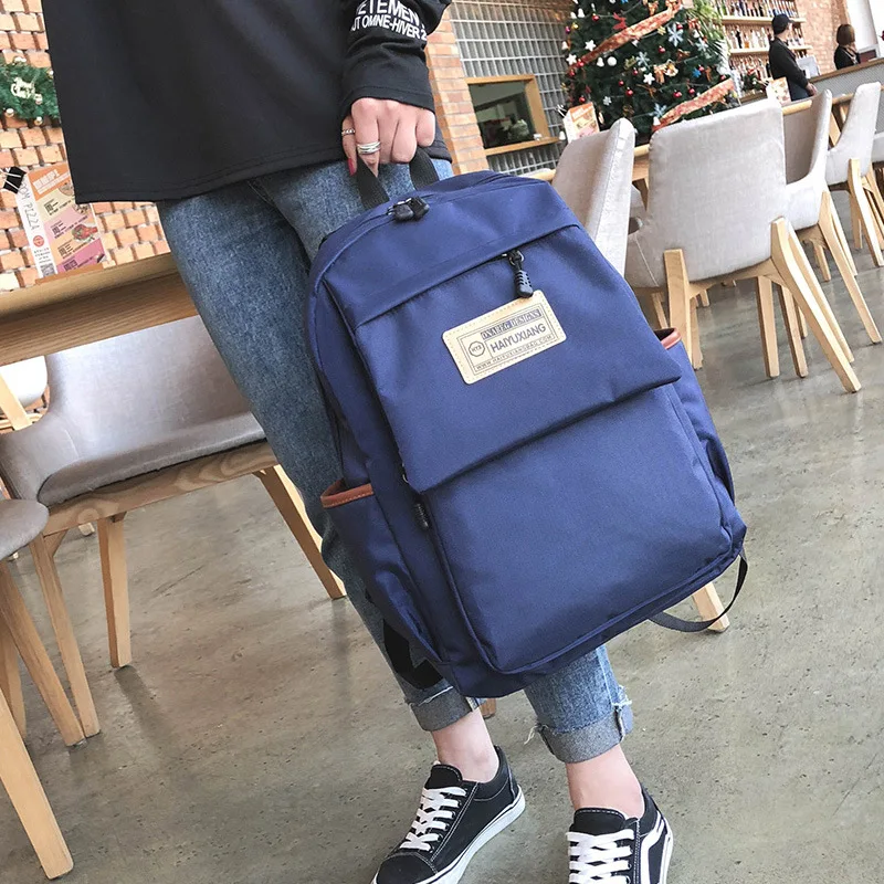 

New Style Solid Color Canvas WOMEN'S Backpack Casual Tide Ride Shoulder Men's Bag