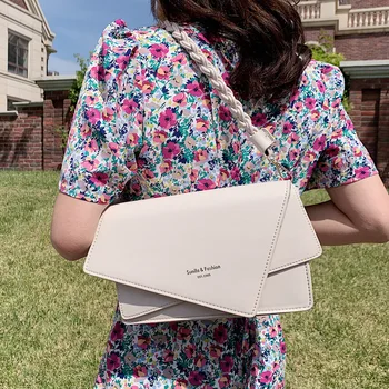 

Summer is simple in early autumn New 2020 Solid color irregular wild fashion Popular small bags Woven shoulder crossbody bag