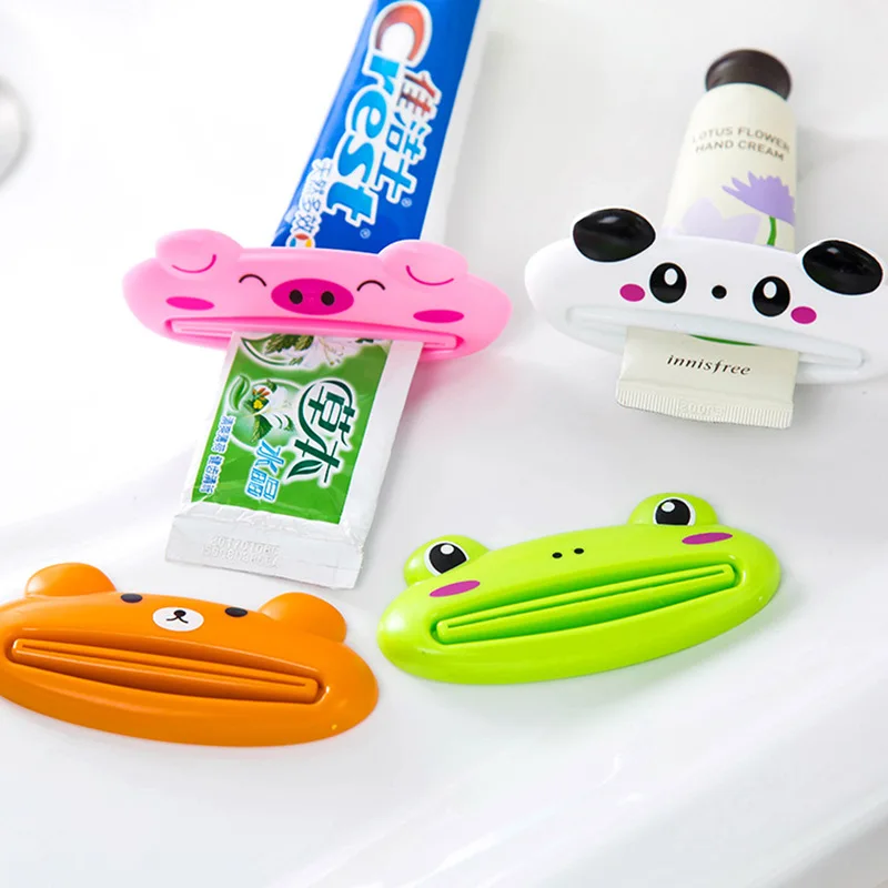 

1pc lovely Easy Toothpaste Dispenser Plastic Tooth Paste Tube Squeezer Useful Toothpaste Rolling Holder For Home Bathroom