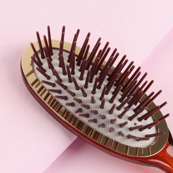

Massage comb oval 4.5 * 17.5 (± 1) cm 51051 amber VORTEX 4901222