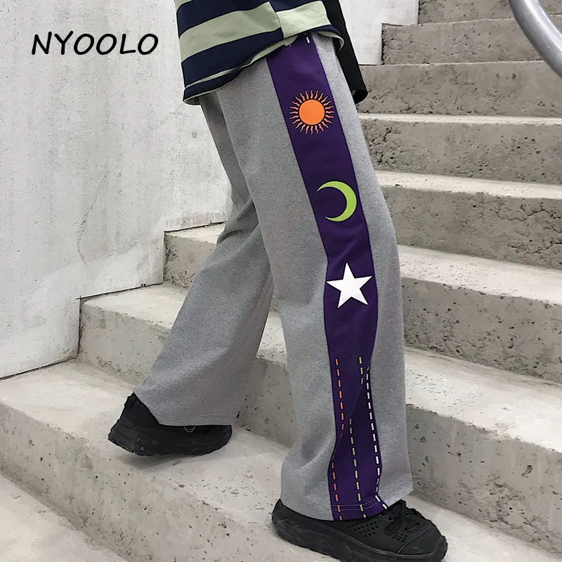 NYOOLO Harajuku дизайн Звезды Луна солнце печати лоскутное свободные брюки осень уличная эластичная талия прямые брюки женские мужские