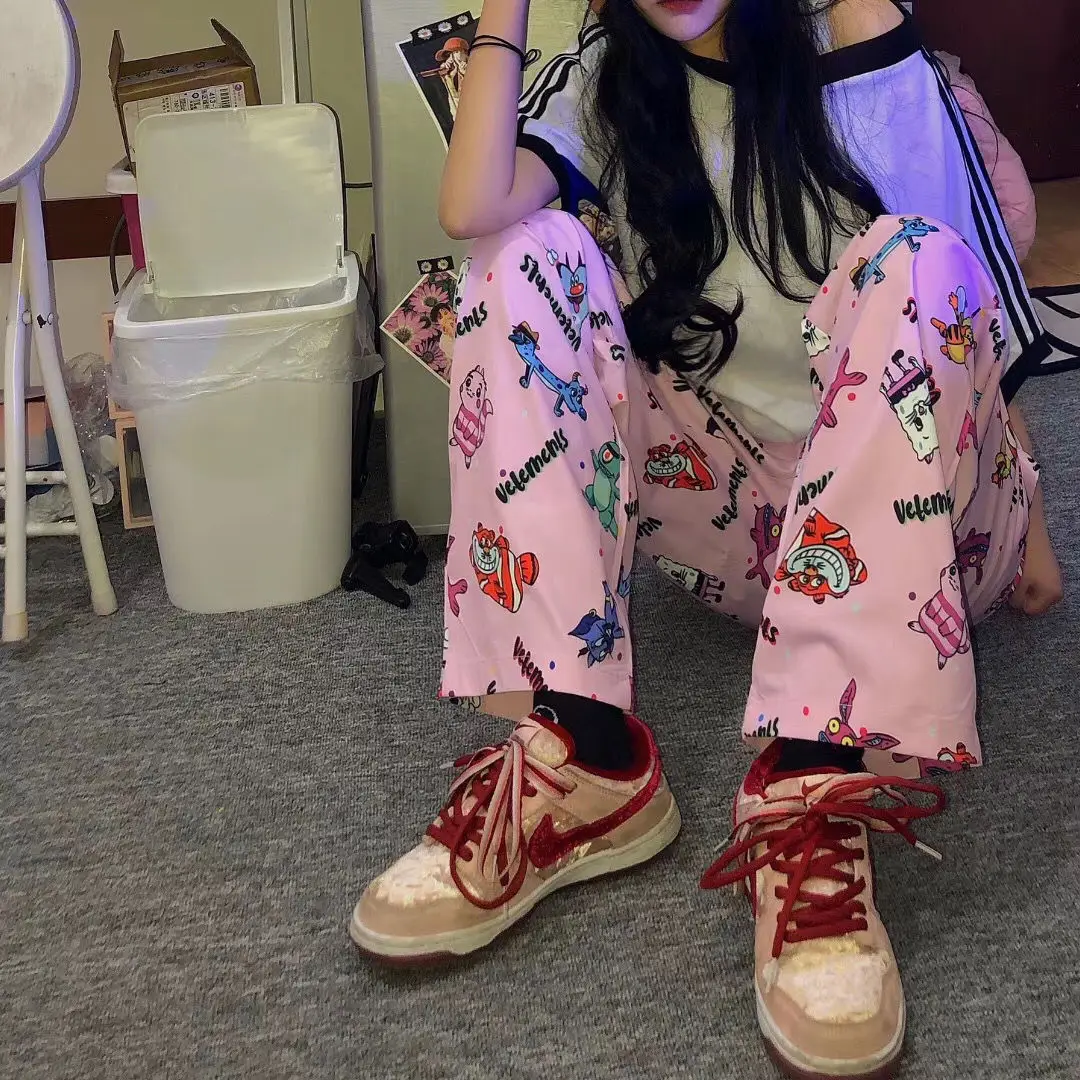 Net celebrity same style tide brand thin imported fabric cartoon printing VTM casual pants pink loose pants women