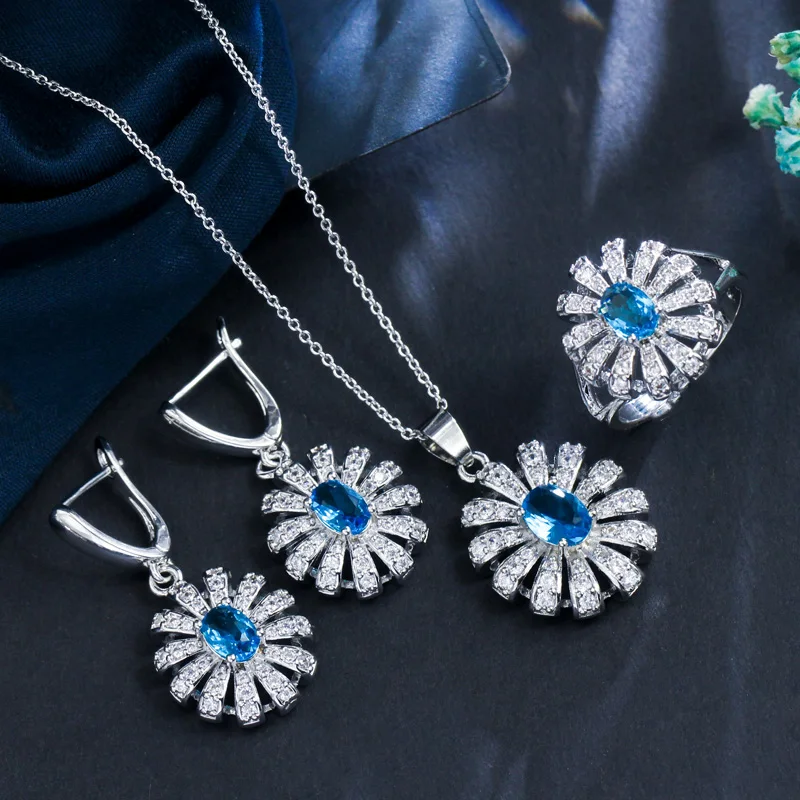 ThreeGraces Green Emerald Cubic Zirconia Stone Flower Necklace Earring and Ring Set 925 Sterling Silver Jewelry for Women JS500 ThreeGraces Green Emerald Cubic Zirconia Stone Flower Necklace Earring and Ring Set 925 Sterling Silver Jewelry for Women JS500