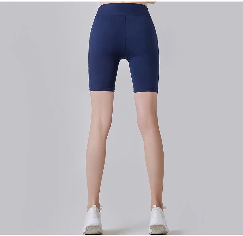 Стиль Ouma боковые карманы Эластичность Slim Fit Штаны Для Йоги Женские поперечные границы анти-экспозиция Спортивные Повседневные спортивные шорты для бега