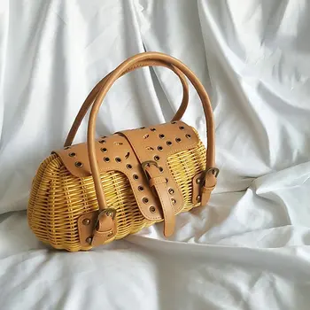 

Carved copper hole carved phoenix eyes rattan handbag lady hand-woven princess shell straw bag