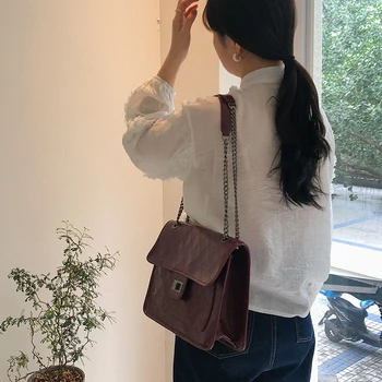

Big bag ladies fashion large capacity mailman straggling bag across shoulder bag jostling with small fragrance ringer chain bag
