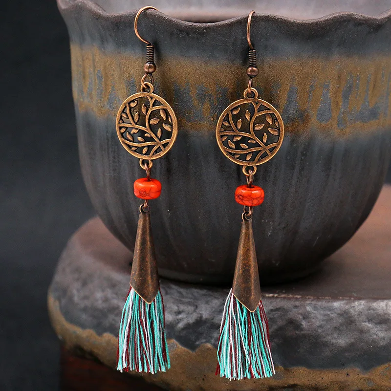 

Fashion and popular tassel earrings retro round hollowed-out flower alloy earrings accessories