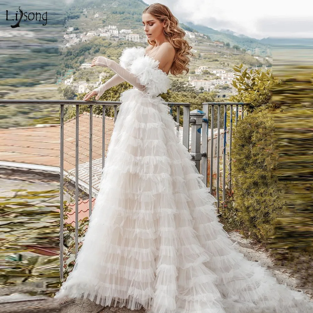 katherine-joyce-2019-bridal-long-sleeves-off-the-shoulder-sweetheart-neckline-lightly-embellished-bodice-tiered-skirt-romantic-a-line-wedding-dress-short-train-6-sdv