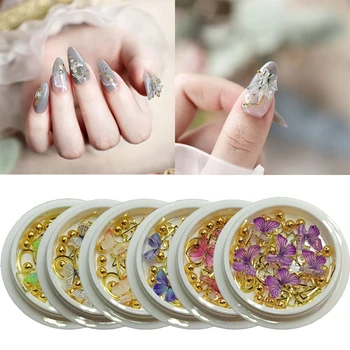 

1 box of nail art accessories butterfly rivets round beads mixed shape combination small magic box DIY nail decorations