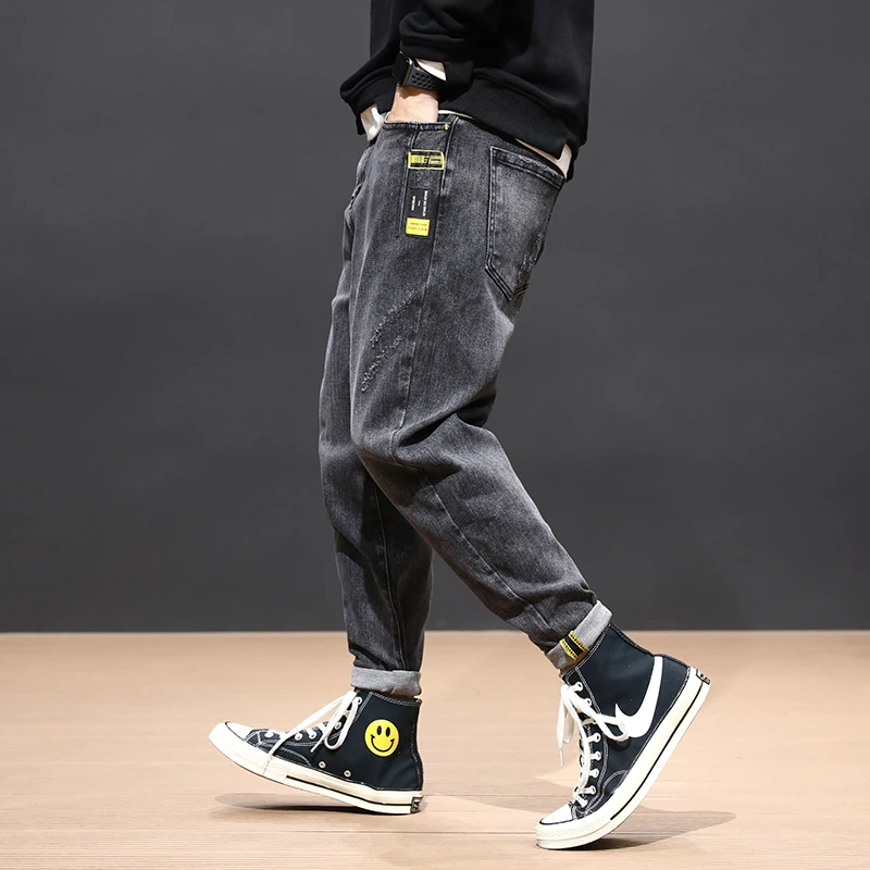 Flash Sale Fashion Streetwear Men Jeans Loose Fit Black Gray Harem Pants High Quality Korean Style Hip Hop Ripped Jeans Men Pencil Pants