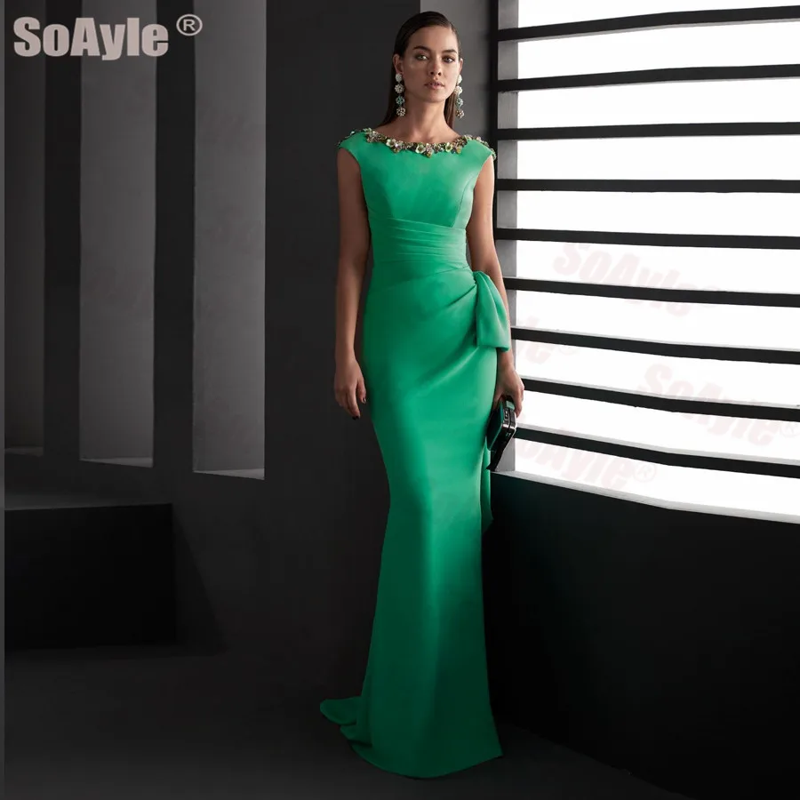 green bateau neckline dress