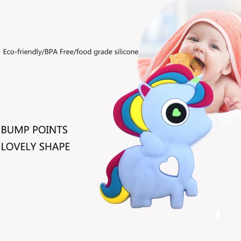 baby chewing on dummy