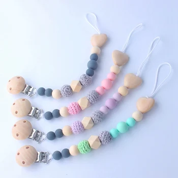 

2Pcs/Set Baby Teether Teething Bracelet Natural Wood Silicone Beads Hand Weave Teether Pacifier Clips Chain Set For Toys Soother