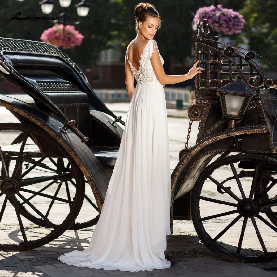 

Lakshmigown Boho Chiffon Long Wedding Dress Beach New Robe Mariage Elegant Summer Bridal Dress 2020 Cap Lace Sleeves with Tassel