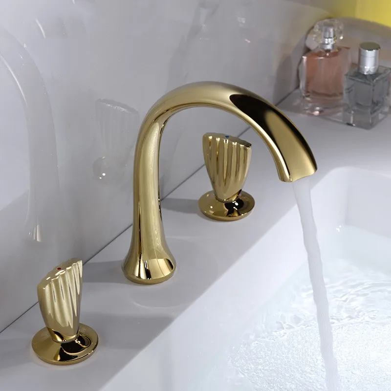 

Luxury Gold Brass bathroom sink faucet Top quality Three holes Two handles Basin mixer faucet Cold hot water Exquisite basin tap