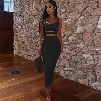 

Bomblook Solid Color Strapless Hollow Out Two Pieces Set Women 2020 Summer High Waist Elastic Skinny Long Skirts Crop Top Female