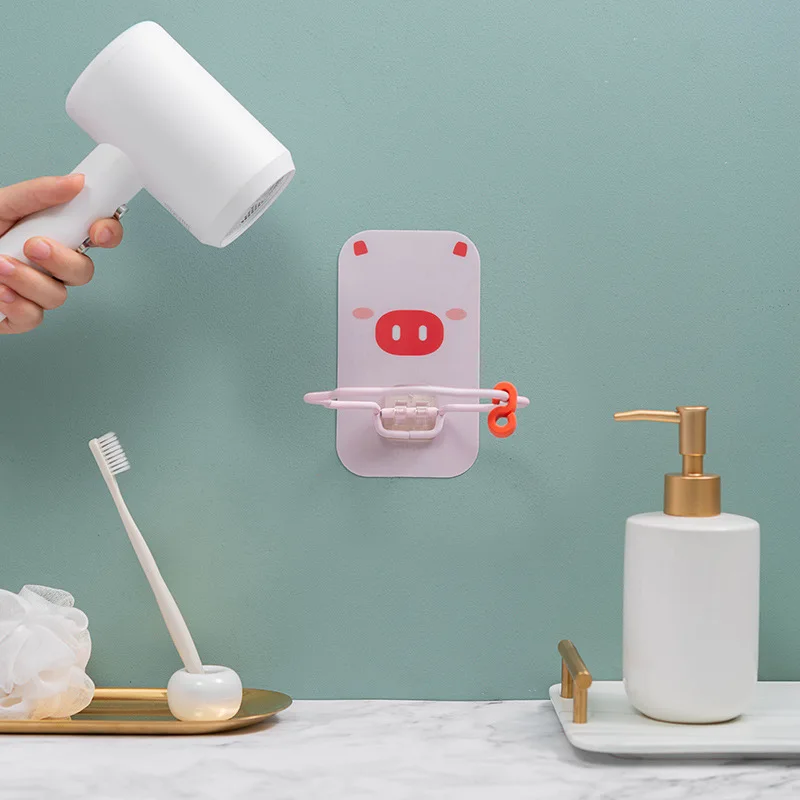 

2020 Simple bathroom wall-mounted No trace punch-free cute hair dryer hanger household small things sorting rack