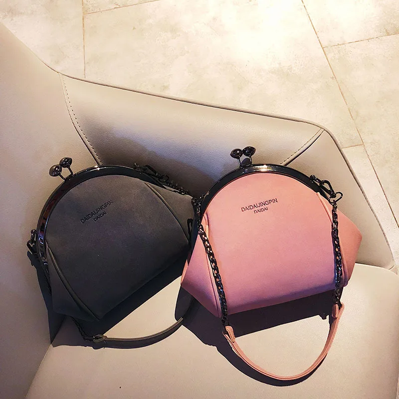 

Grinding tentacles iron clamps shell pillow bag name Yuanfeng single shoulder oblique span woman bag