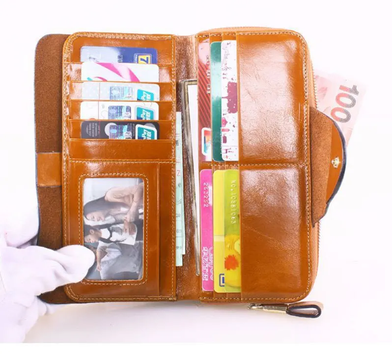 男女通用钱包_2016真皮韩版拉链手拿包-头层油蜡长款男女---阿里巴巴_14.jpg_.webp