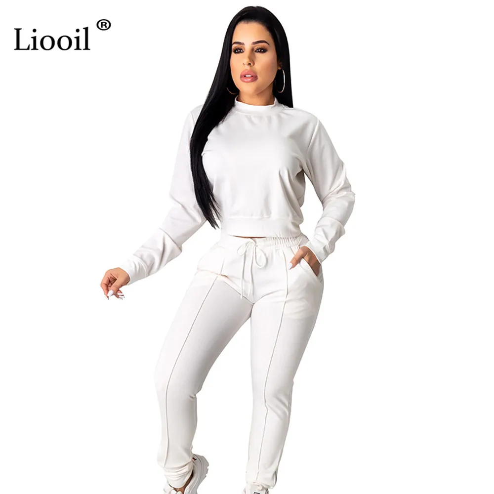 Liooil черно-белый спортивный костюм женский комплект из двух предметов Осень-Зима с длинным рукавом сексуальный укороченный топ и брюки-карандаш спортивные комплекты