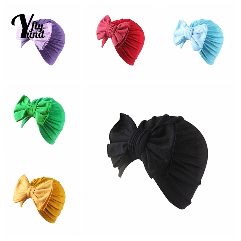 

Yundfly 1 PCS Autumn and Winter Fashion Warm Infant Indian Hat Solid Color Handmade Bowknot Baby Caps Bows Headwear Holiday Gift