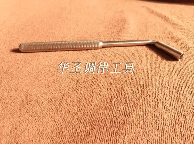 Piano tuning tool, keyboard guide pin, adjustment spanner
