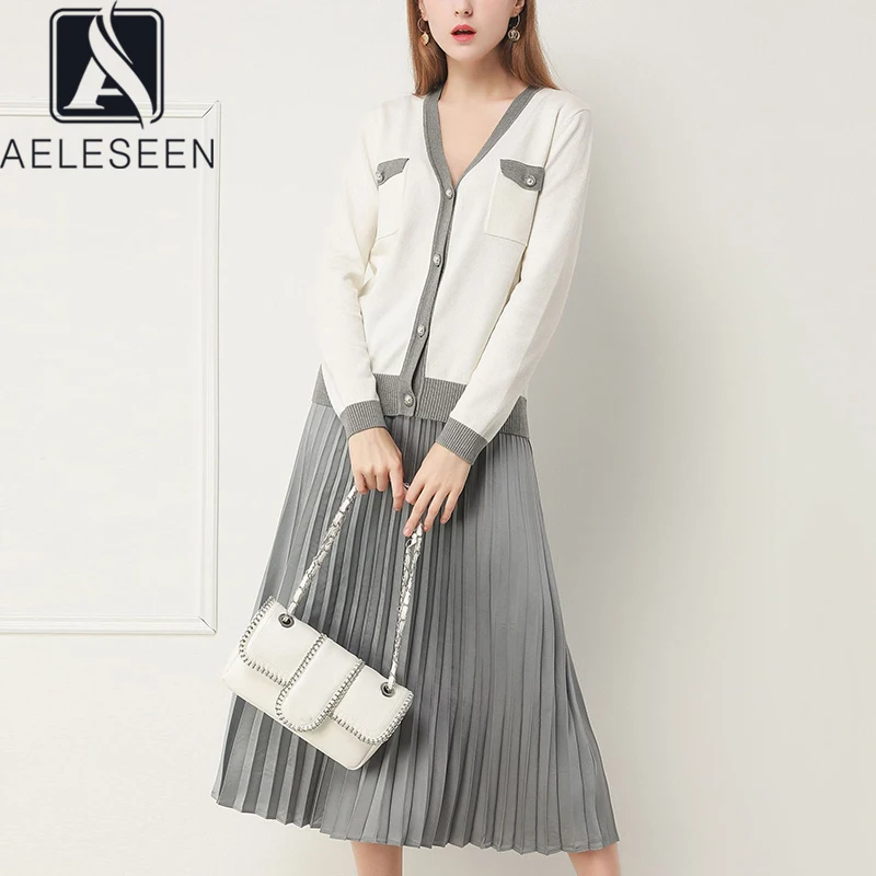AELESEEN 2020 Lente Nieuwe Engels Stijl Kantoor Dame Twinset Hoge Kwaliteit Parel Knop Breien Tops + Geplooide Midi Rok Pak AELESEEN 2020 Lente Nieuwe Engels Stijl Kantoor Dame Twinset Hoge Kwaliteit Parel Knop Breien Tops + Geplooide Midi Rok Pak