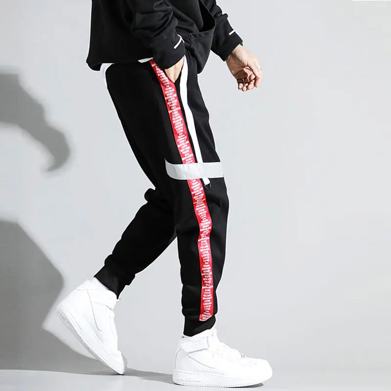 

Korean Style Fashion Men Jeans Black Color Loose Fit Spliced Designer Harem Pants Stripe Printed Hip Hop Jeans Men Joggers Pants