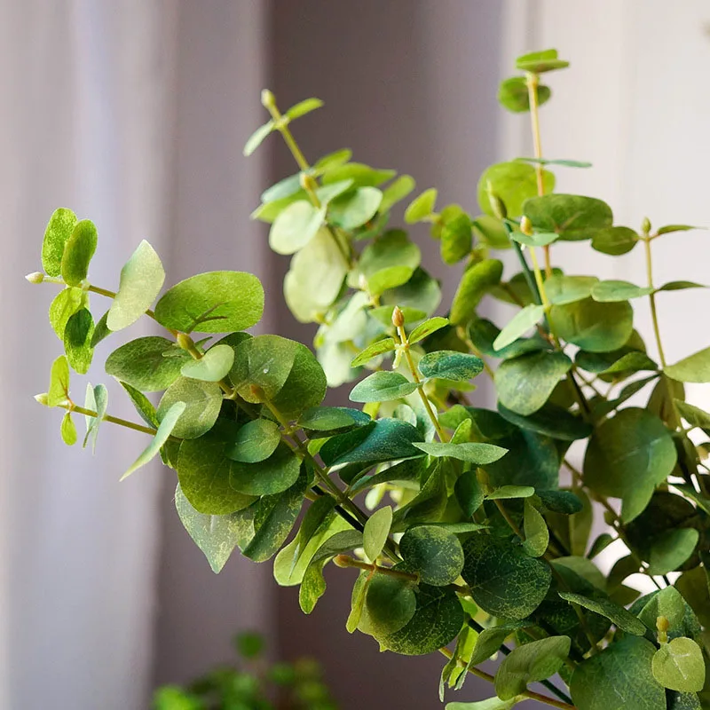 

Green Artificial Leaves Large Eucalyptus Leaf Plants Wall Material Decorative Fake Plants For Home Shop Garden Party Decor 55cm