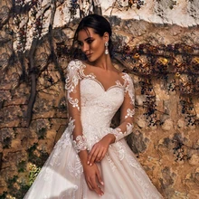 

Luxury White A Line Wedding Dresses Sweetheart Lace Appliques Illusion Long Sleeves Bride Gowns Elegant Vestido De Novia 2022