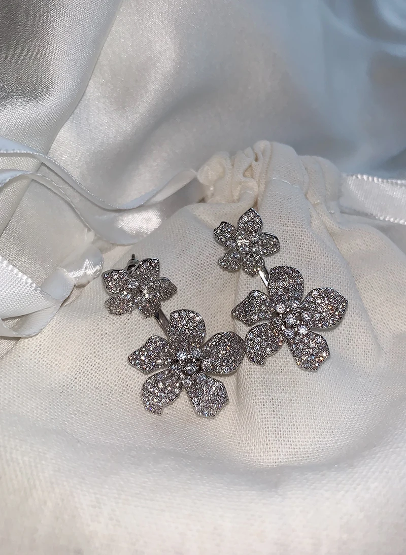 

Autumn and winter new socialite temperament stereo camellia rear hanging dual-purpose earrings
