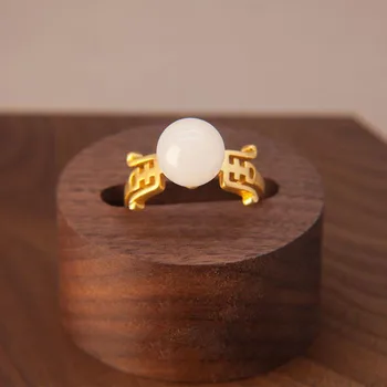 

SNew silver inlaid natural Hetian white Chalcedony hollow Chinese retro temperament opening adjustable women's ring