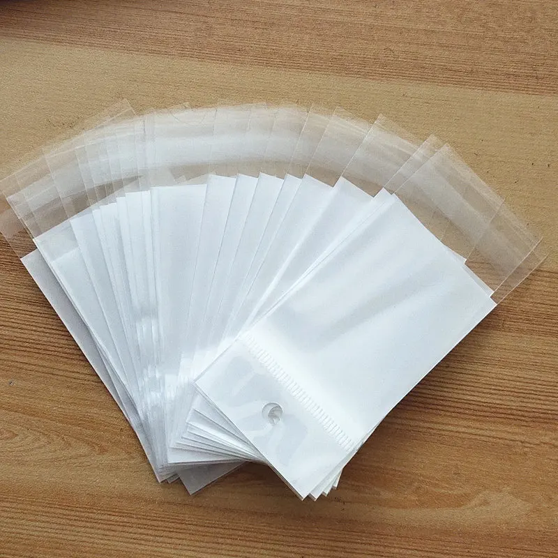 

20pcs/lot 4.5x10cm Double Layer OPP Hanging Hole Stickers Self Adhesive Transparent Plastic Bag Jewelry Packaging Bags Gift Bag