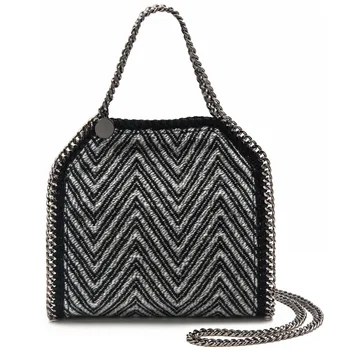 

The new ladies shoulder bag rhombus handbags. Fashion diagonal bag. Small bag cotton and linen chain bag