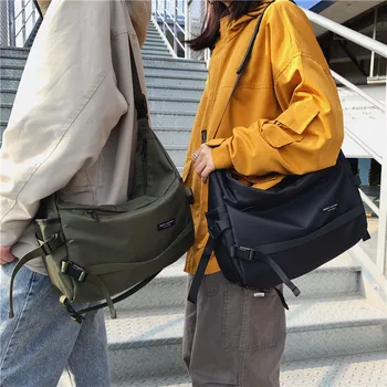 

Original design Brand Originality Design Handheld Notebook computer straddle backpack men's net red retro straddle big bag