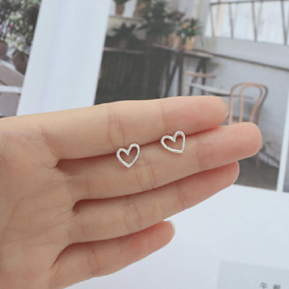 

Female Heart Stud Earrings 925 Sterling Silver Earrings Fashion Women Jewelry Gifts Simple Hollow Elegant Statement Earrings
