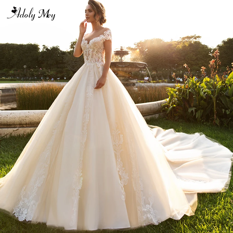 

Adoly Mey Gorgeous Appliques Chapel Train A-Line Wedding Dresses 2020 Romantic Scoop Neck Beaded Princess Wedding Gown Plus Size
