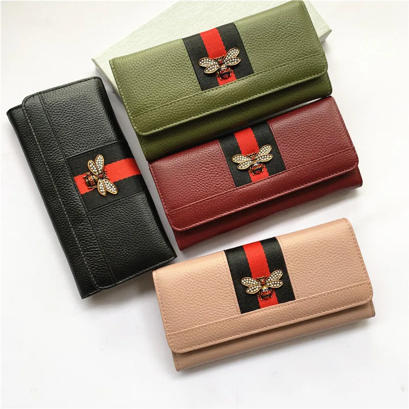 

Leather short paragraph bee pearl small wallet female Europe and the United States new leather color thin multi-card bit wallet