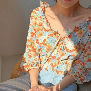 

ZCSMLL 2020 summer Korean chic age-reducing foreign eyes bright flowers small white V-neck lace-up fungus waist short shirt