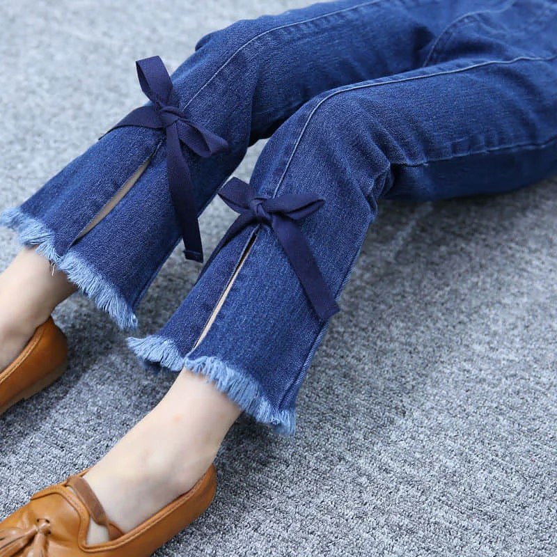 

Girls' jeans spring and autumn new children's wear long pants, big children's bow-knot flared pants, autumn tassels