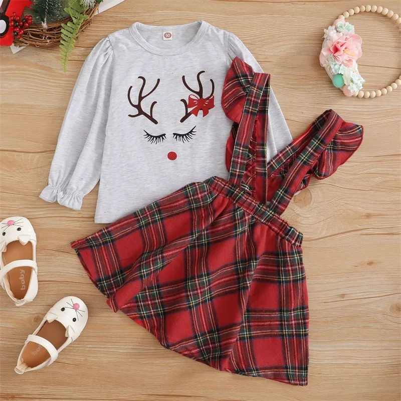 

Toddler Girls Christmas Outfits Girls Elk Print Puff Sleeve Round Neck Pullover + Plaid Ruffle Suspender Skirt Outfits 2 Pcs