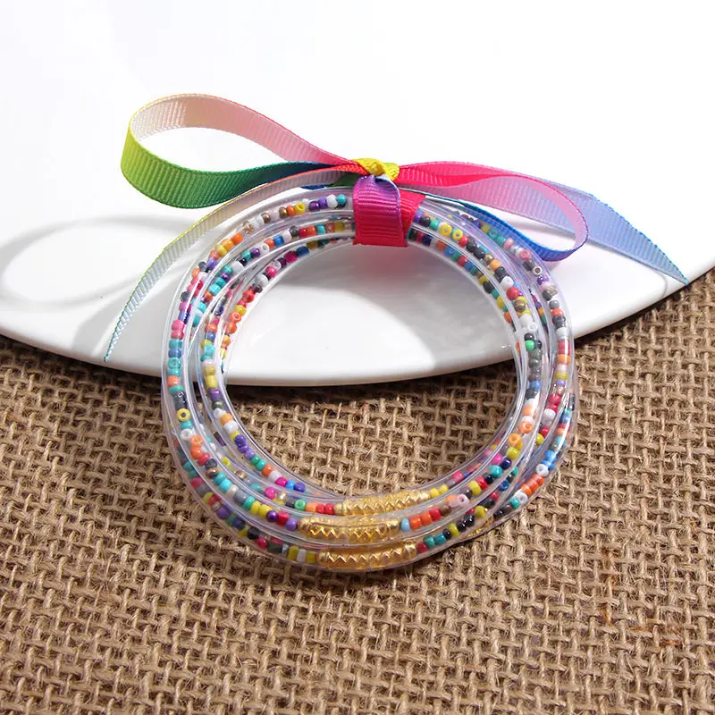 JJFOUCS 5 шт./компл. блестящие желе браслеты 32 цвета бусины заполнены силиконовые пластиковые браслеты «бантик» для женщин девочек любую погоду оптом