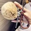 Fluffy Real Rabbit Fur Keychain Pompom Ball Leather Key Ring Holders Charm Women Bag Car Pendant Jewelry Trinket Accessories ► Photo 1/6