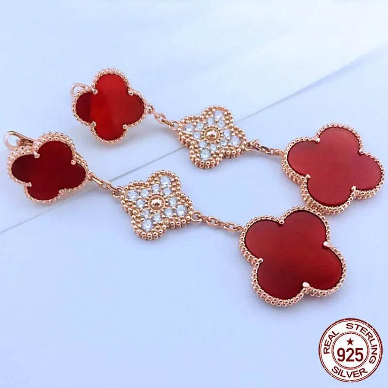 

S925 sterling silver earrings new three-flowered four-leaf clover style temperament fashion style to send a lover birthday gift