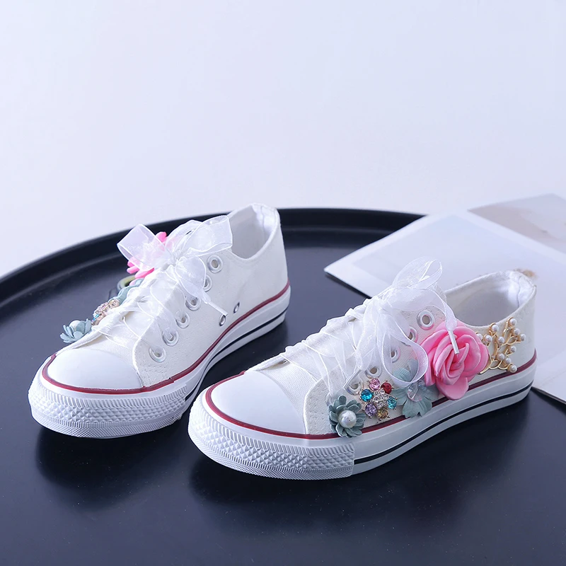 white flower trainers